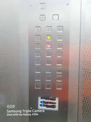 a close up of a vending machine with a remote control at Male Room at Plaza Rah, KL City Centre in Kuala Lumpur