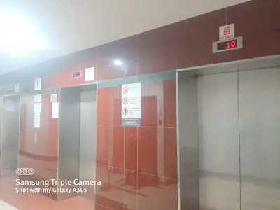 an entrance to an airport with a glass door at Male Room at Plaza Rah, KL City Centre in Kuala Lumpur