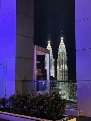 a view of a city skyline at night at The Platinum KLCC By Homestay in Kuala Lumpur