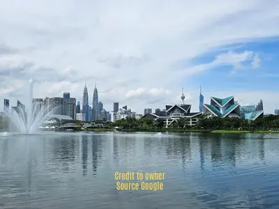 a view of a city from across a body of water at Puncak Sentul KL with 3 Bedroom Homestay in Kuala Lumpur