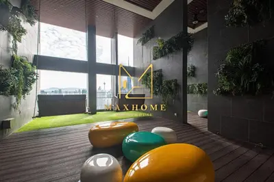 a room with a bunch of donuts on the floor at Maxhome Cozy at Riveria KL in Kuala Lumpur