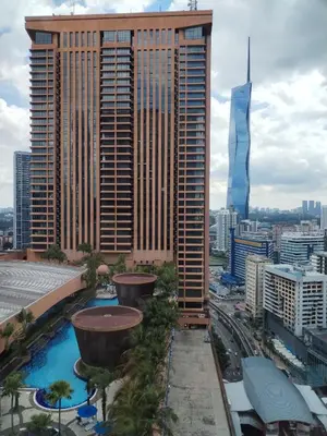 a view of a city with a large building at SkS Service suite at times square in Kuala Lumpur