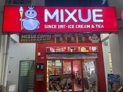a mixle ice cream and tea store with a sign at KL City 3BR 3Bath Condo , Razak city ,TV box & Pool in Kuala Lumpur