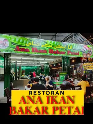 a restaurant with a sign in front of it at Legasi Kampong Baru By AMNA for Malay Only in Kuala Lumpur