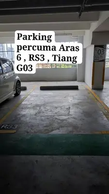 a parking garage with a parking permit sign on the wall at Legasi Kampong Baru By AMNA for Malay Only in Kuala Lumpur