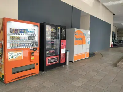 two vending machines in a store with drinks at Camellia Serviced Suites in Kuala Lumpur