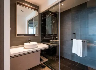 a bathroom with a sink and a mirror at Expressionz Suite KL City Center KLCC in Kuala Lumpur