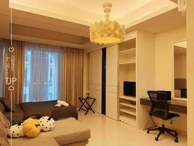 a living room with a bed and a desk and a chandelier at Damas Suite Sri Hartamas 4 pax Link to Mall in Kuala Lumpur