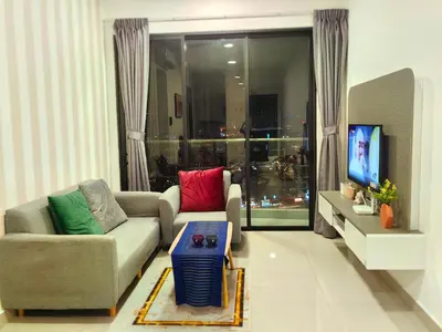 a living room with a couch and a tv at lavile 3 \u623f in Kuala Lumpur