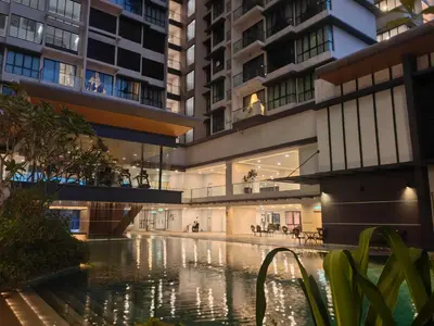a building with a pool of water in front of it at lavile 3 \u623f in Kuala Lumpur