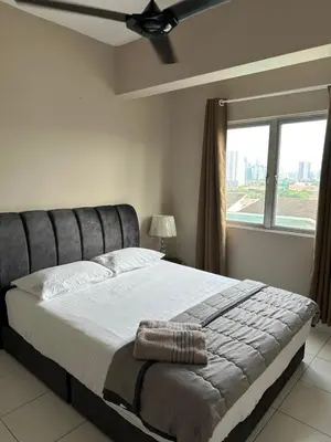 a bedroom with a large bed with a window at Cozy 2BR Apt AxisAtrium Mall wPool Pandan Indah Ampang Kuala Lumpur in Ampang