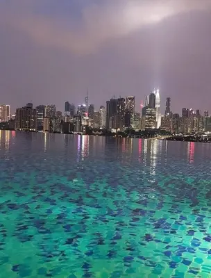 a large body of water with a city in the background at #KLCC#LRT#Datum#Jelatek#Shopping #Internet 4G-5G in Kampong Datok Keramat