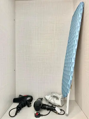 a room with a surfboard and headphones on the floor at 7Pax Muji Continew KL Centre View 10mins to TRX KLCC IKEA in Kuala Lumpur
