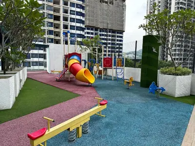 a playground with a slide and play equipment on a building at Skyline Homes by Reizz in Kuala Lumpur