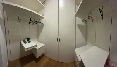 a bathroom with white cabinets and a sink in it at The Platinum kuala lumpur By MAJU in Kuala Lumpur
