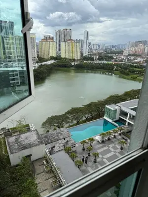 a view of a river from a window at Zetapark condominium in Kuala Lumpur