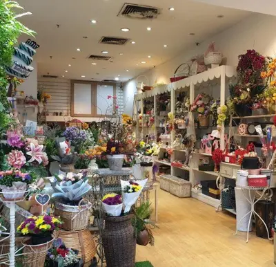 a flower shop with many different types of flowers at Cosy studio with King size bed \u9752\u65c5\u4e00\u65cf in Kuala Lumpur