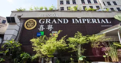 a sign on the front of a grand imperial building at Cosy studio with King size bed \u9752\u65c5\u4e00\u65cf in Kuala Lumpur
