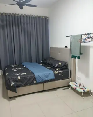 a bedroom with a bed and a black curtain at LSH33 Condo DUKE Sentul KL in Kuala Lumpur