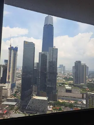 a view of a city skyline with tall buildings at Agile Malaysia Apartment KL in Kuala Lumpur