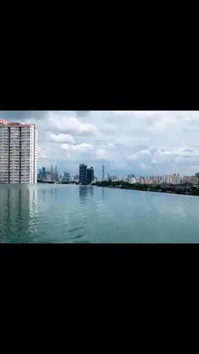 a large body of water with a city in the background at Cozy Kenwingston Setapak 3BR & 2BR 5-8 Pax l Parking & Netflix 3201 in Kuala Lumpur