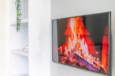 a flat screen tv with a fire on it at Platinum in Kuala Lumpur
