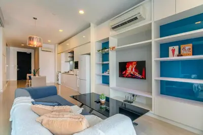 a living room with a couch and a tv at Platinum in Kuala Lumpur
