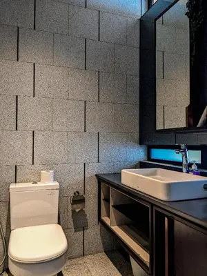 a bathroom with a white toilet and a sink at Skyline Homes by Myfly247 in Kuala Lumpur