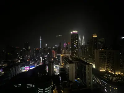 a view of a city at night with lights at Axon Residence Bukit Bintang by Comfort Stay in Kuala Lumpur