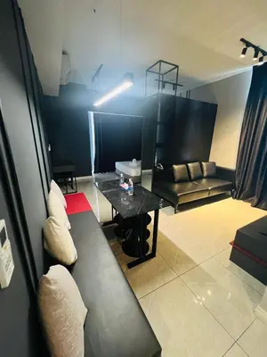 a living room with a couch and a table at Axon Residence Bukit Bintang by Comfort Stay in Kuala Lumpur