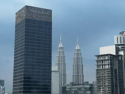 a group of tall buildings in a city at Axon Residence Bukit Bintang by Comfort Stay in Kuala Lumpur