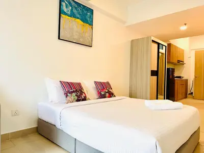 a bedroom with a large bed in a room at The Luxe & Colony KLCC By LuxeHub in Kuala Lumpur