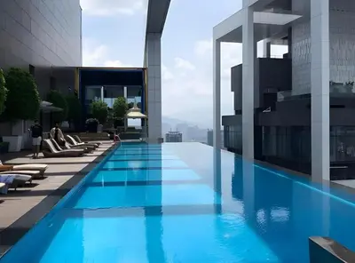 a swimming pool on top of a building at The Calma, Platinum Suites 2 BR in Kuala Lumpur