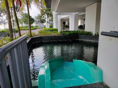 a swimming pool in the middle of a house at Premium Stay Central KL Next to TRX Mall & IKEA in Kuala Lumpur