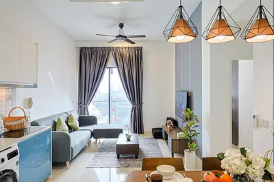 a living room with a couch and a table at Premium Stay Central KL Next to TRX Mall & IKEA in Kuala Lumpur