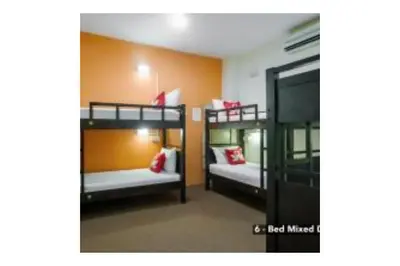 a room with two bunk beds in it at The Explorers Guesthouse and Hostel in Kuala Lumpur