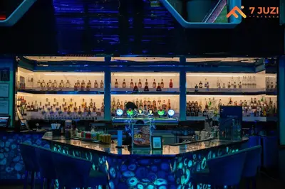 a bar with a lot of bottles on the wall at Sky Pool KLCC 2BR Platinum Suite C33 with Netflix in Kuala Lumpur