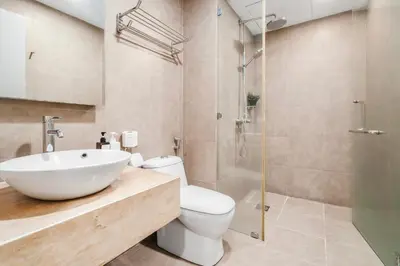 a bathroom with a sink and a toilet and a shower at Bintang Fairlane near Pavillion Bukit Bintang in Kuala Lumpur