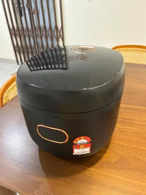 a black object sitting on top of a table at The Little Bali - 6Room - 18Pax in Kuala Lumpur