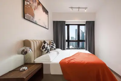 a hotel room with a bed and a window at Agile Bukit Bintang by Avery at KLCC#5 mins to Pavilion &TRX#Garden Pool#Free Parking#中英文房东 in Kuala Lumpur