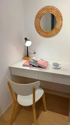 a table with a chair and a mirror and a lamp at M Centura Sentul, Jalan Sentul Pasar, Sentul KL City in Kuala Lumpur
