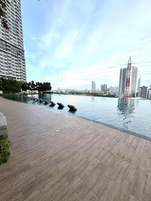 a view of a river in a city with buildings at M Vertica Homestay in Kuala Lumpur