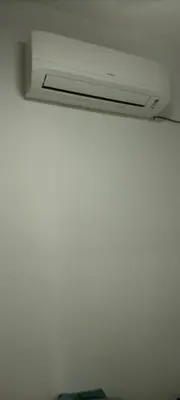 a room with a white ceiling with a vent at Flora Residency Setapak in Kuala Lumpur