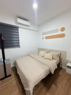 a bedroom with a bed and a window at M Vertica KL Cheras in Kuala Lumpur