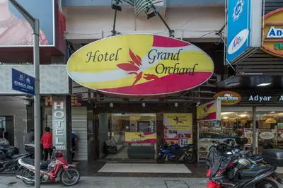 a hotel grand ovation sign in front of a store at Hotel Grand Orchard in Kuala Lumpur