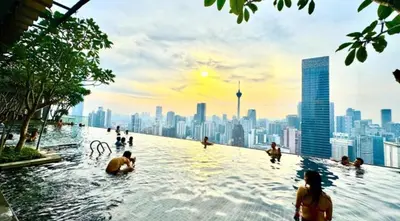 a rendering of a infinity pool with a city skyline at Bukit Bintang in Kuala Lumpur