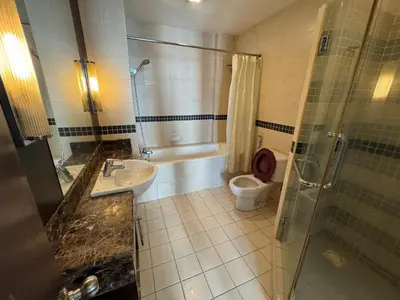 a bathroom with a toilet and a shower and a sink at KLCC Pavilion 127 Alor Street Ceylon KL Bukit Bintang 5 Pax in Kuala Lumpur