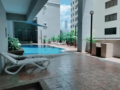 a swimming pool in the middle of a building at KLCC Pavilion 127 Alor Street Ceylon KL Bukit Bintang 5 Pax in Kuala Lumpur