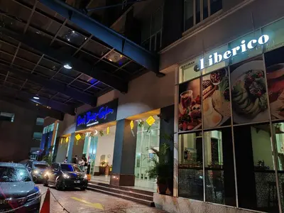 a store with cars parked in front of it at KLCC Pavilion 127 Alor Street Ceylon KL Bukit Bintang 5 Pax in Kuala Lumpur