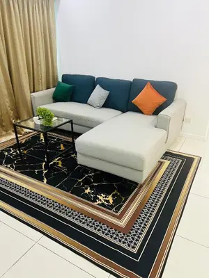 a living room with a couch and a coffee table at Mercu summer suits 1BR luxury couple room free Netflix 5mint WD KLCC by Top R in Kuala Lumpur